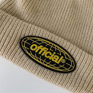 OFFICIAL beige beanie/knitted cap - Black/Yellow Logo (never worn)